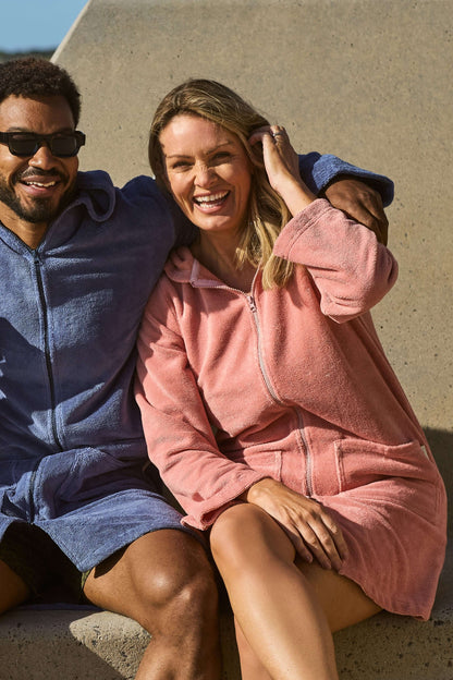 Woman smiling with her guava hooded towel on. Guava Women's Hooded Towel