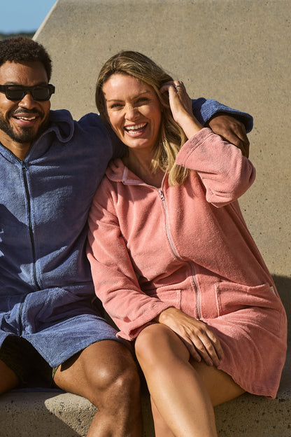 Woman smiling with her guava hooded towel on. Guava Women's Hooded Towel